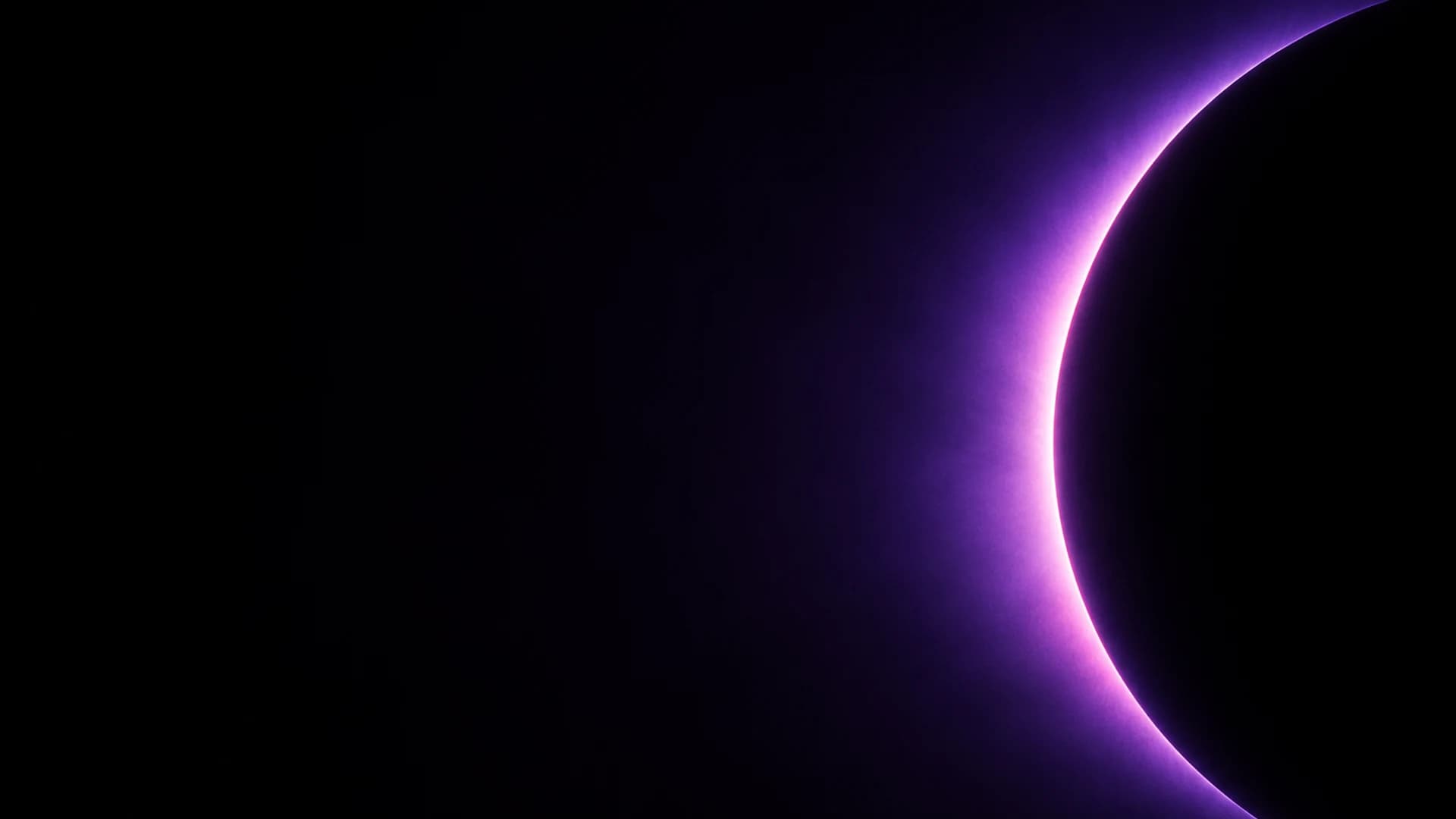 Purple eclipse over a dark field